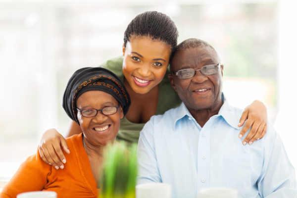 portrait of happy African family at home