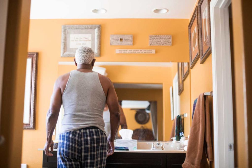 Senior man in bathroom