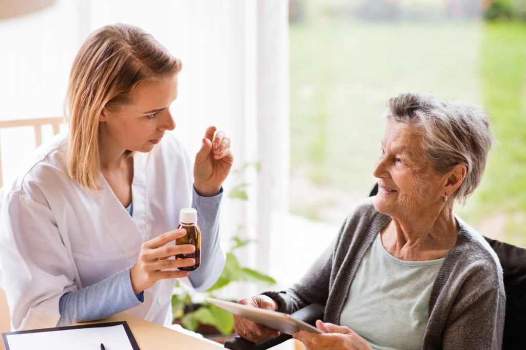 elderly with doctor medication