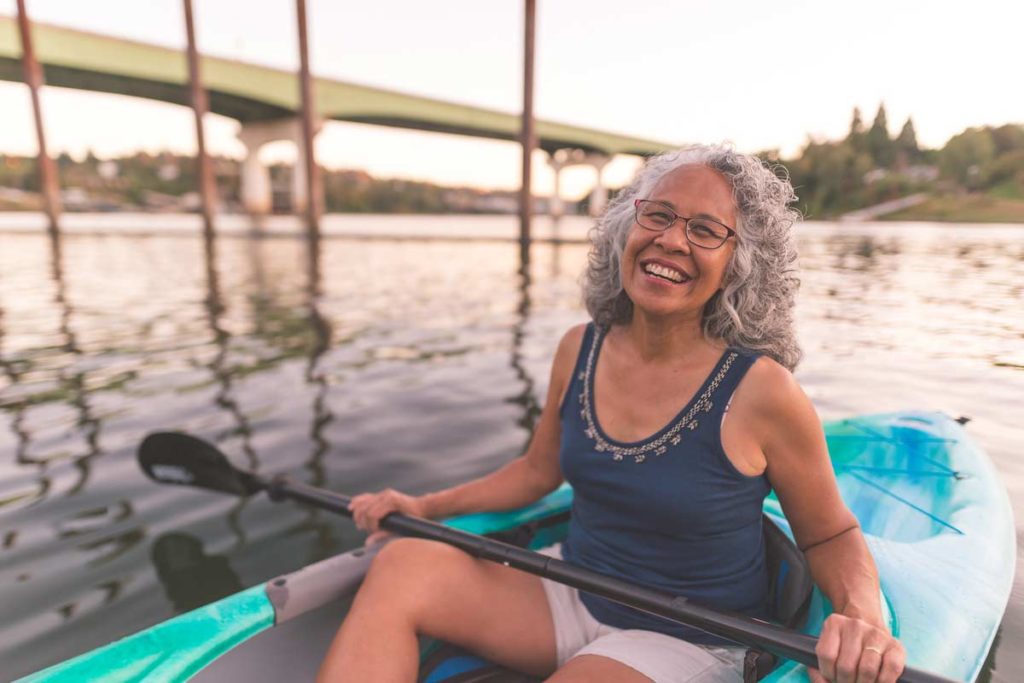 senior women kayaking