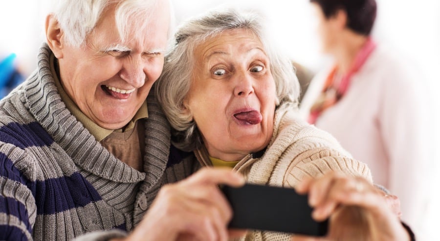 senior couple takinga selfie