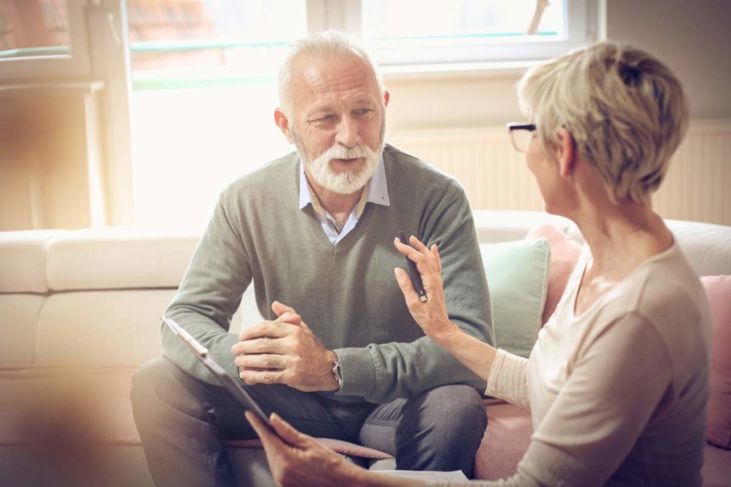 senior couple discussing a will