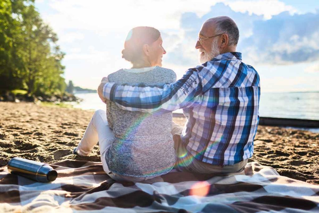 senior couple on the beach